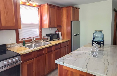 Caye Caulker Cottage | Beachfront abode with well-equipped kitchen - pool, beach, grill, & canoe access