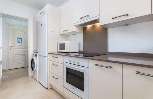 Estepona Apartment | Beachfront apartment with air-con, large sun-terrace (& loungers), WiFi & UKTV