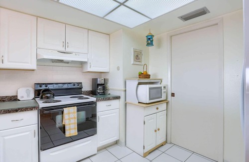 Indian Rocks Beach Condo | Beachfront Beauty with Private Balcony, Pool, Tennis, Hot Tub, FREE Activities! ~ 210 Reef Club