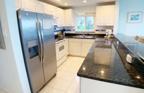 Rum Point Condo | Beachfront Beauty & Panoramic Views -The Retreat #23 - Steps out to Two Beaches