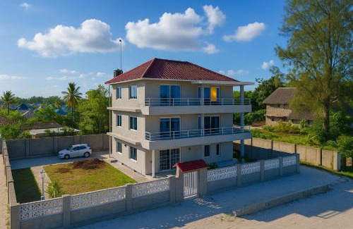 Uroa Apartment | Beachfront Bliss 2-BR Master Suites with Balcony & Free WiFi Uroa, Zanzibar