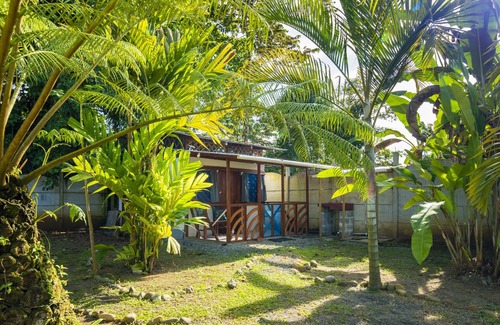 Manzanillo Cabin | Beachfront Casita for 2, loft-style double bed & kitchenette with shaded porch