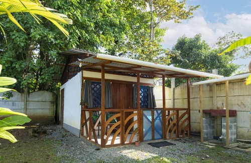 Manzanillo Cabin | Beachfront Casita for 2, loft-style double bed & kitchenette with shaded porch