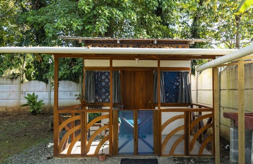 Manzanillo Cabin | Beachfront Casita for 2, loft-style double bed & kitchenette with shaded porch
