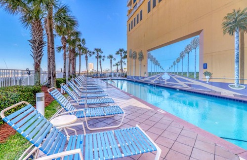 Panama City Beach Condo | Beachfront condo with sweeping views, washer/dryer, shared pool, grill, & AC