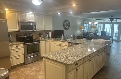 Holiday Isle Condo | Beachfront Condo - beach chair setup included