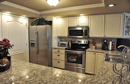 Holiday Isle Condo | Beachfront Condo - beach chair setup included