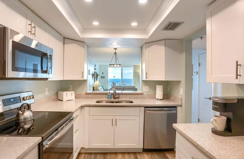 Indian Shores Condo | Beachfront Condo w/Private Balcony! Pool & Hot Tub, FREE Parking & FREE Activities! ~ 607 Sandcastle