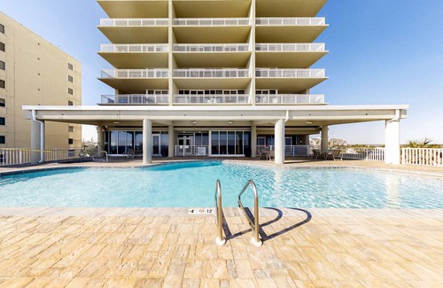 Gulf Shores Condo | Beachfront condo with pool, hot tub, balcony, fitness room & amazing corner view