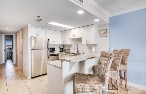 Gulf Shores Condo | Beachfront condo with outdoor pool, balcony, incredible views, & AC