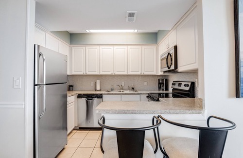 North Ocean City Condo | Beachfront condo with great views, balcony, pools & game room
