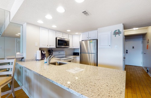 North Ocean City Condo | Beachfront corner condo with balcony, views, pools, game room, gym & sauna