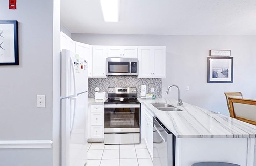Gulf Shores Condo | Beachfront Dog-Friendly Condo w/Balcony, Shared Pool, Sauna, Basketball, Gym