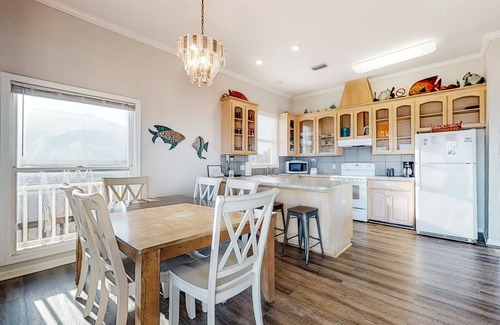Plantation House | Beachfront dog-friendly home with private hot tub, boardwalk, on-site pools, gym
