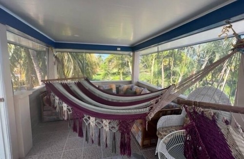 Tela House | Beachfront getaway,5 minutes from shore! Featuring a pool & recreational spaces.