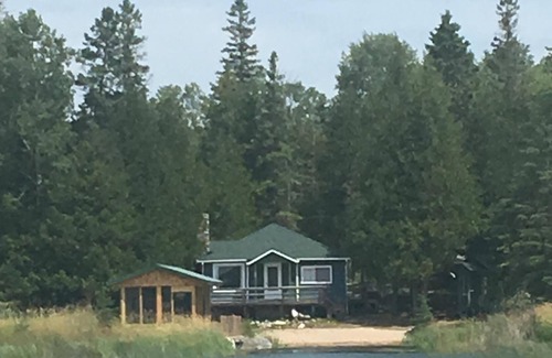Hessel Cottage | Beachfront Getaway on Quiet Bay leading to Lake Huron