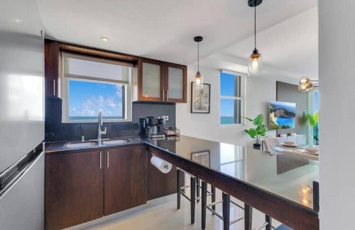 Carolina Apartment | BeachFront Haven/Isla Verde Prime Location/Parking