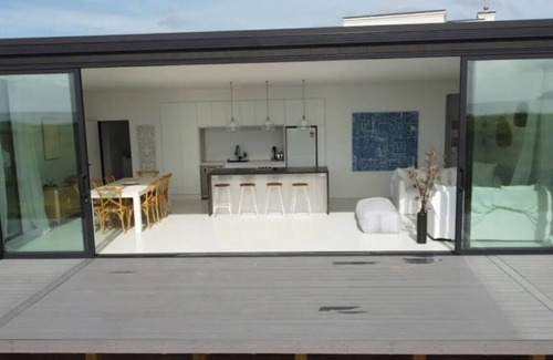 Ruakaka House | BEACHFRONT holiday home with stunning views& modern comforts -1h35 from Auckland
