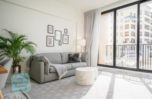 Al Hamra Village Apartment | Beachfront Luxury 1BR Sea View
