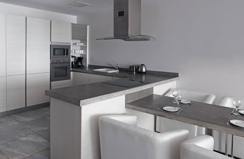 Fryes Beach Villa | Beachfront modern comber townhouse with pool at Ffryes Beach