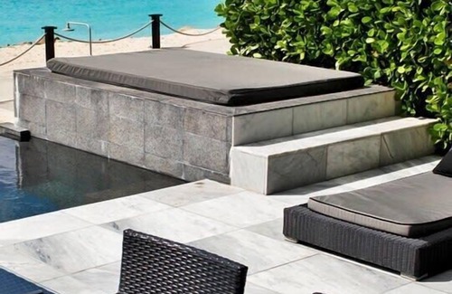 Fryes Beach Villa | Beachfront modern comber townhouse with pool at Ffryes Beach
