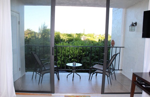 Williams Town Condo | Beachfront Paradise - Condo Living with Hotel Quality