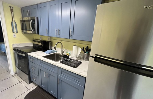 Panama City Beach Condo | Beachfront! Pool! Pet friendly! Near Pier Park! 1st floor! Beach chairs!