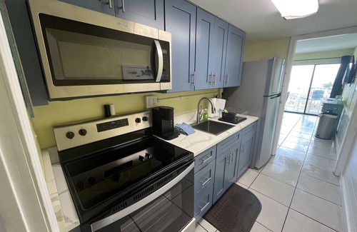 Panama City Beach Condo | Beachfront! Pool! Pet friendly! Near Pier Park! 1st floor! Beach chairs!