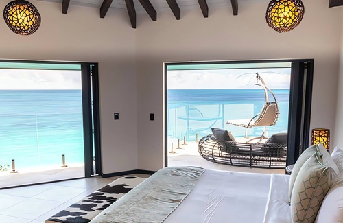 Fryes Beach House | Beachfront Relaxation Suite with Breathtaking Sea Backdrop - Near Ffryes Beach