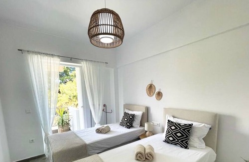 Haniotis Apartment | Beachfront Retreat: "The Beach House" - Your Perfect Vacation Getaway