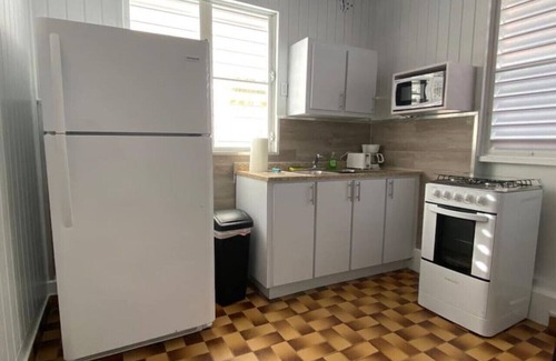 El Combate Cabin | Beachfront Rustic Cabin by Sunset Village - Purple