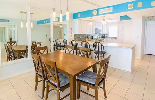 Biltmore Beach Condo | {Beachfront, Tiki Bar, Heated Pool, Hot Tub, Gym, FREE Beach Chair Service}