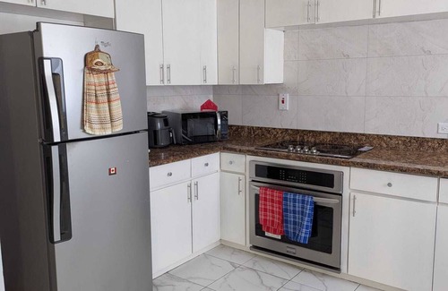 Orange Bay House | Beachfront Townhome at Little Bay Country Club: Pool, Beach, Backyard & More!