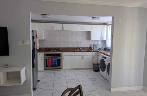 Orange Bay House | Beachfront Townhome at Little Bay Country Club: Pool, Beach, Backyard & More!