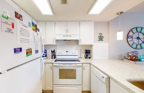 Sneads Ferry Condo | Beachfront condo with ocean views, balcony, on-site pool, gym, sauna & AC