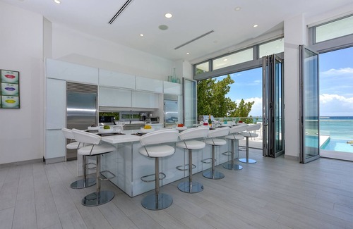 Savaneta House | Beachfront Villa Infinity Pool, Gym, Media room. 6 Bedrooms 7 baths. Sleeps 13