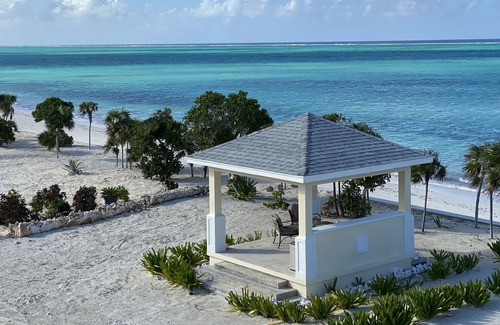 Whitby House | Beachfront, wifi-enabled, whole-house A/C, room for 7, & watersports equipment