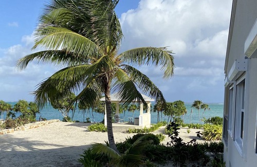 Whitby House | Beachfront, wifi-enabled, whole-house A/C, room for 7, & watersports equipment
