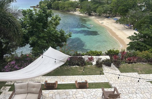 Orange Bay Villa | Beachhouse Villa located on a small bluff on a private beach. Ideal for families