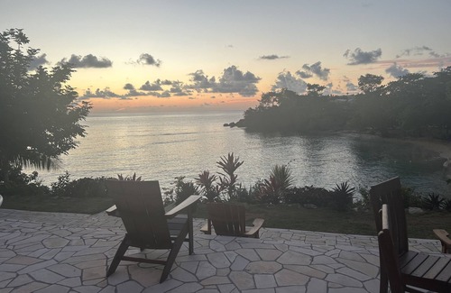 Orange Bay Villa | Beachhouse Villa located on a small bluff on a private beach. Ideal for families