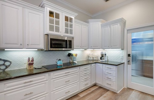 Anna Maria House | Beachology: 1 Block to Bean Point Beach, Pool, Game Room by Anna Maria Life Vacation Rentals