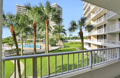 Marco Island Condo | Beachside Bliss at South Seas! Beach Access, Pool View and Thoughtful Amenities.