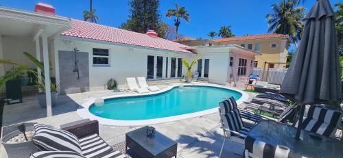 Hollywood Lakes Villa | Beachside Bliss Pool Retreat Half mile to Beach