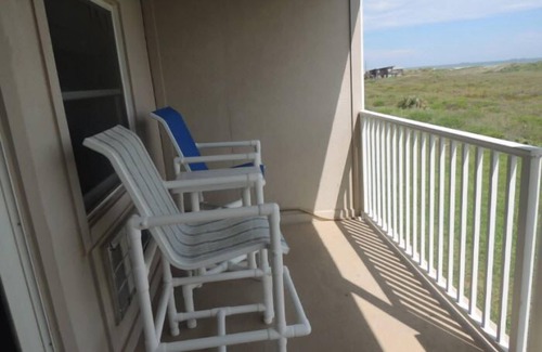 Port Aransas Apartment | Beachside condo, sleeps four. Stunning views from private balcony!