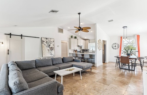 Mid Island House | Beachside Retreat: 2BD/2.5BA + Jet Ski Lifts + Epic Game Room & SHARED Pool!