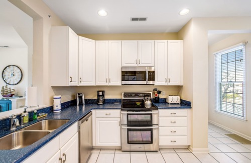 Ocean View Condo | Bear Trap Dunes lake view 2nd floor condo, with pools, golf, sauna-dog-friendly