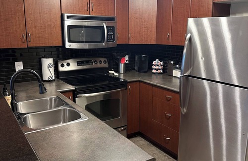 East Kootenay Condo | Bears Den, sleeps 6, lakefront, amazing location, sun deck overlooking pool/lake