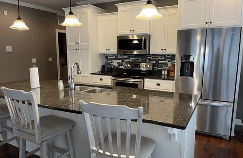 Arnolds Park Condo | Beautiful 1st floor corner condo in the Brooklyn Bridge Building at Bridges Bay!