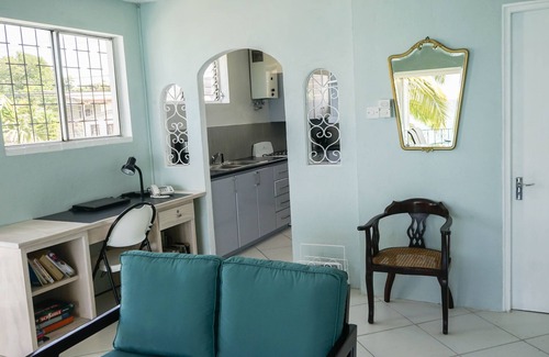 Derricks Apartment | Beautiful 2-Bedroom Apartment right on the beach in this tranquil little bay