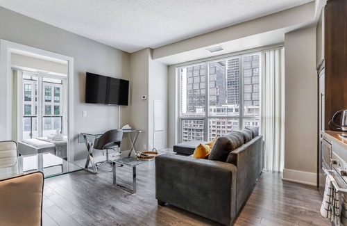 Wellington Place Condo | Beautiful 3 Bedroom 2 Bath Condo Suite - Fully Equipped, Fully Furnished